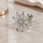 14k white gold, diamond Jasmine flower flat back stud earring on a glass reflective surface