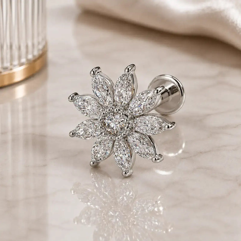 14k white gold, diamond Jasmine flower flat back stud earring on a glass reflective surface