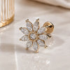 14k yellow gold, diamond Jasmine flat back stud earring on a glass reflective surface