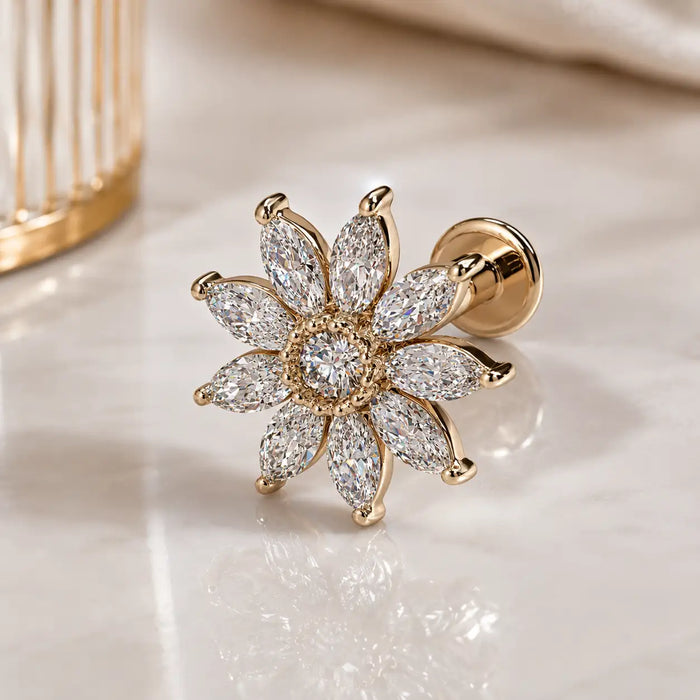14k yellow gold, diamond Jasmine flat back stud earring on a glass reflective surface