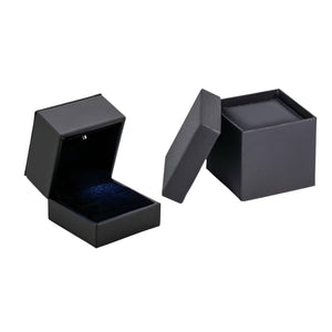 LED light-up ring box open beside its black gift carton outer box, showing blue interior
