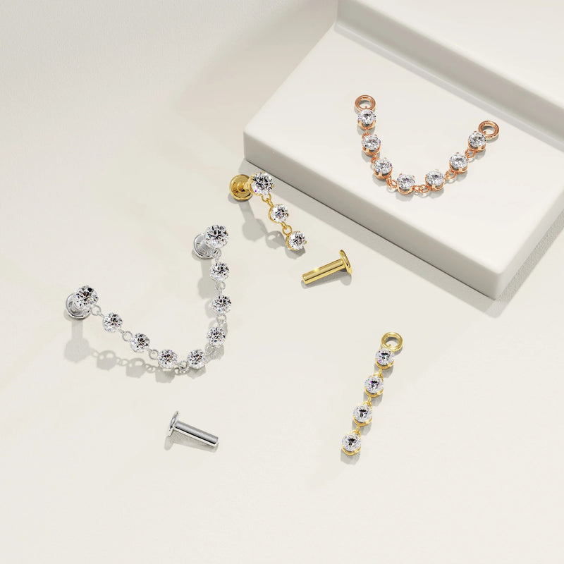 Lyra connector flat back studs disassembled in white gold, yellow gold, and rose gold showing posts and chain