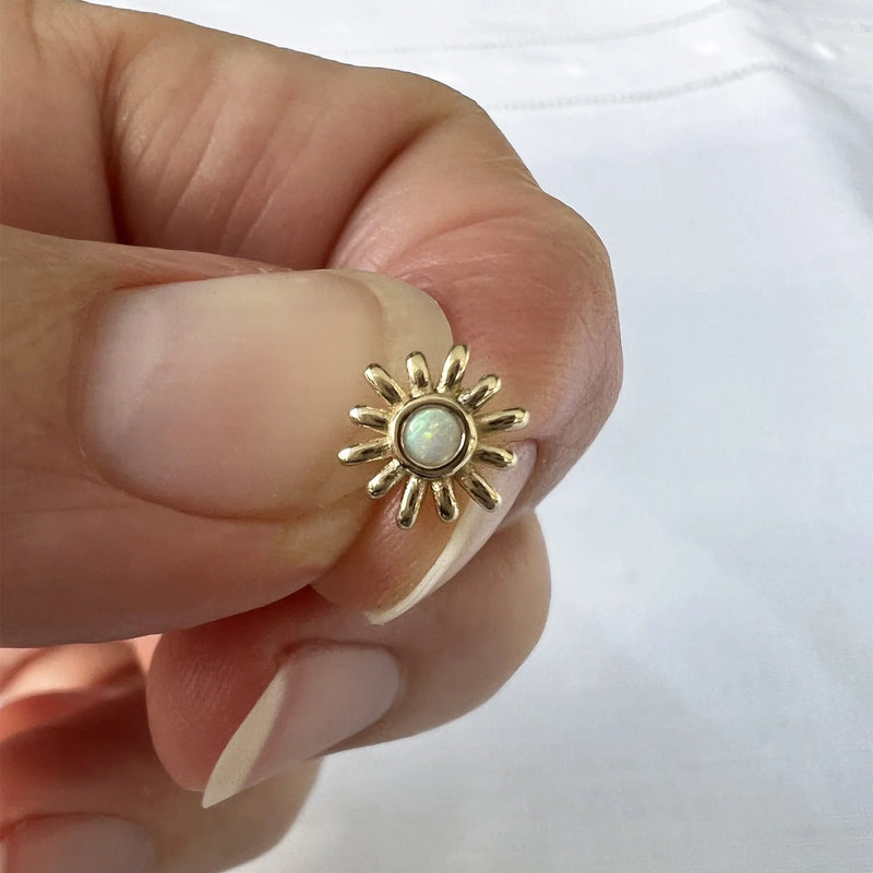Malibu Shimmer 14k gold opal sun threadless end held for size reference