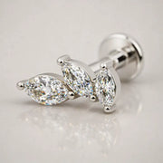 14k white gold marquise diamond cascade labret stud, angled view highlighting three-stone leaf silhouette
