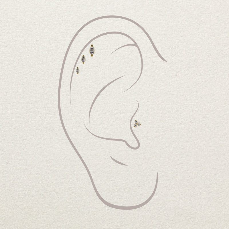 Diagram showing marquise diamond flat back studs styled in helix and lobe piercing placements
