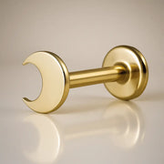 14K yellow gold crescent moon flat back labret, angled view showing post and flat disc backing
