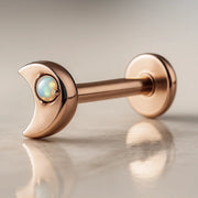 14k rose gold crescent moon opal flat back labret, angled view showing post and flat disc backing