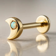 14k yellow gold crescent moon opal flat back labret, angled view showing post and flat disc backing