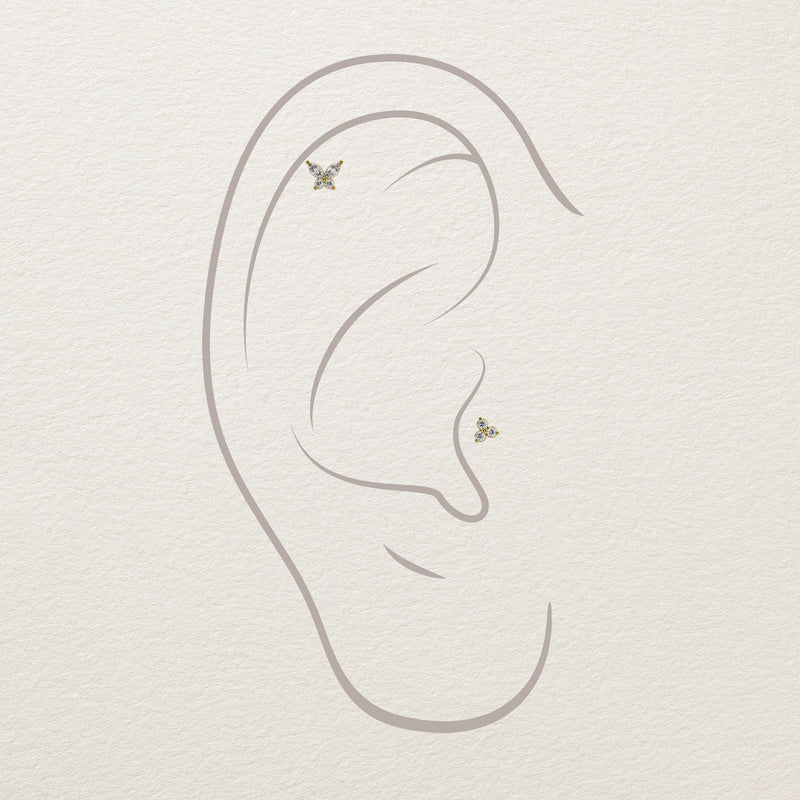 Illustration of diamond butterfly stud ends placed in helix and lobe piercing positions on ear diagram