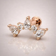14k rose gold diamond pear climber flat back stud, angled view showing warm-toned climbing arc design