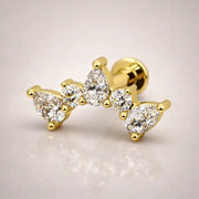 14k yellow gold diamond pear climber flat back stud, angled view showing curved climbing silhouette