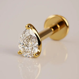 14k yellow gold 3mm pear-cut diamond flat back labret stud, angled view showing 3-prong teardrop setting