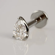 14k white gold 3mm pear-cut diamond flat back labret stud, angled view showing 3-prong setting and disc