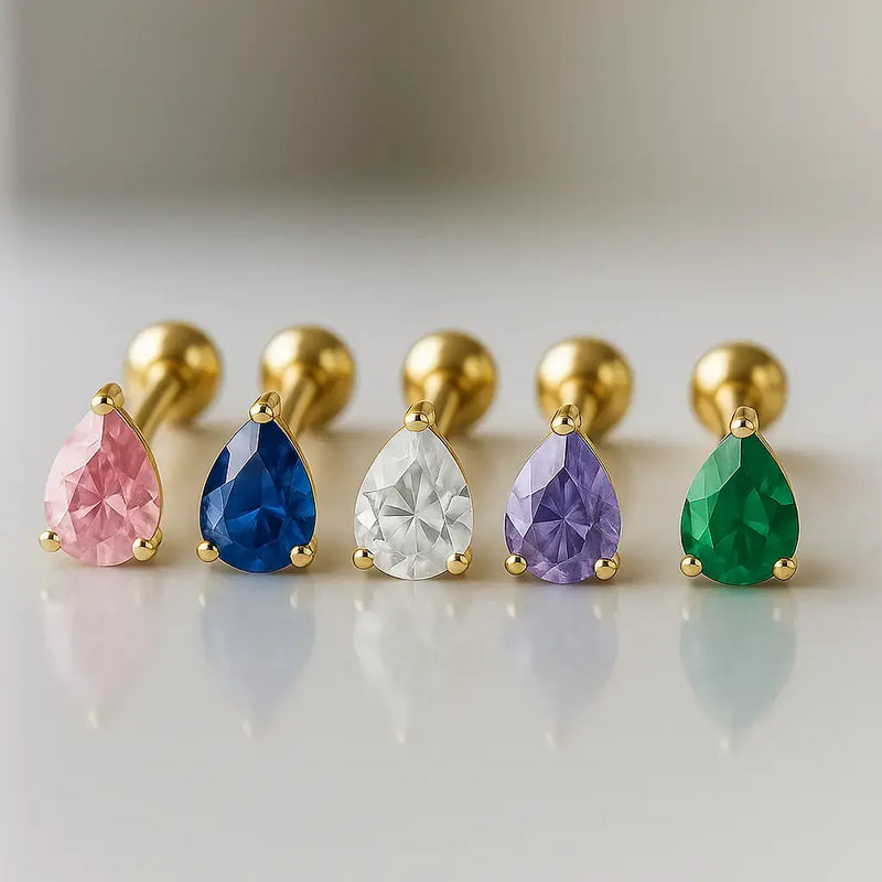 Five pear-cut gemstone flat back studs in 14k gold showing pink, blue, clear, purple, and green color options