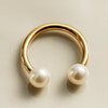 14K yellow gold circular barbell with two cultured white pearls, angled lifestyle shot
