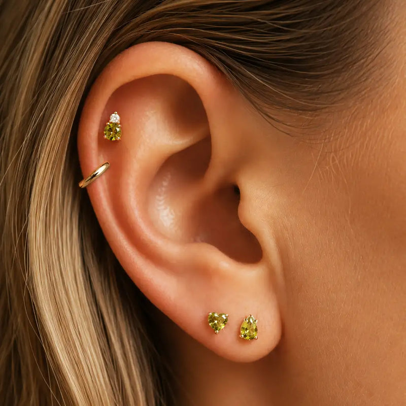 Peridot and diamond curated ear stack in solid 14k gold