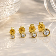 14K yellow gold diamond perlage stud earrings in three sizes showing bead bezel setting comparison