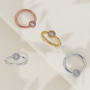 Diamond perlage fixed bead ring in all four metal options: rose gold, yellow gold, and two white gold styles