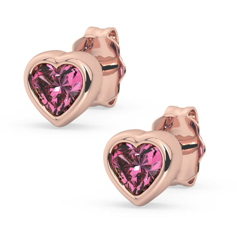 14k rose gold pink sapphire heart stud earrings pair, product render with vivid pink stones in rose gold bezels