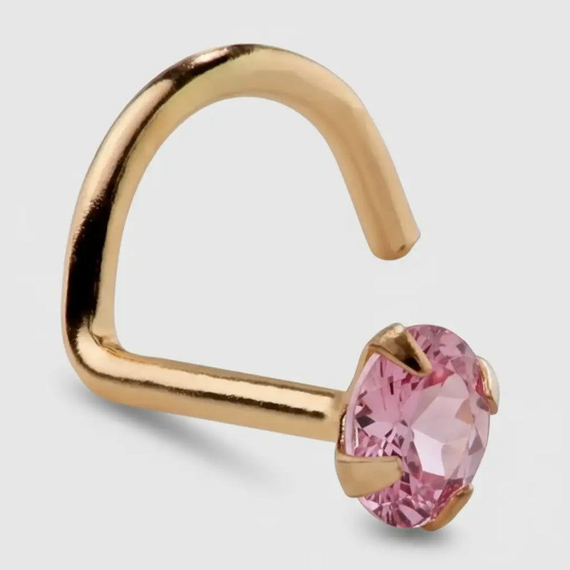 14K yellow gold pink tourmaline nose ring twist style, angled view showing screw shape and prong-set gem
