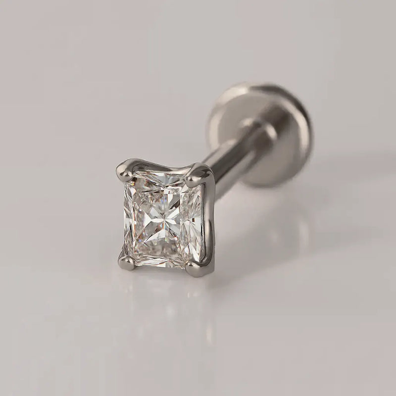14k white gold 2.3mm radiant-cut diamond flat back labret stud, angled view on neutral background