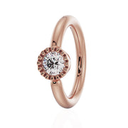 14k rose gold diamond Perlage fixed bead ring with milgrain bezel setting, angled front view
