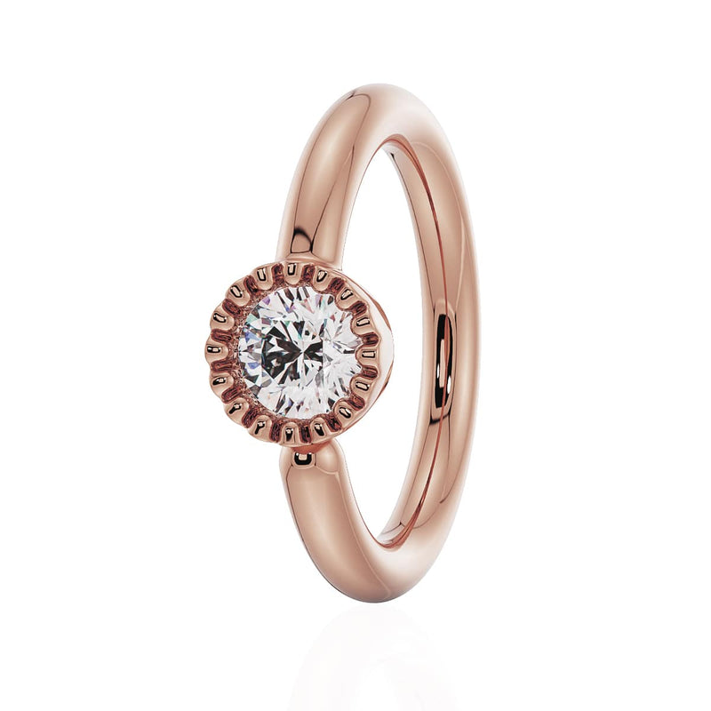 14k rose gold diamond Perlage fixed bead ring with milgrain bezel setting, angled front view