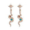14K rose gold snake drop earrings with natural turquoise and ruby stones, north star stud top, pair view