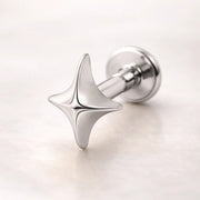 14k white gold sparkle flat back stud with four-point star charm, angled view on light background