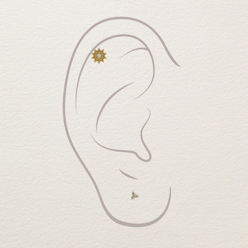 14k gold opal sunburst stud end shown on illustrated helix cartilage ear piercing