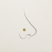 14k gold opal sunburst threadless end shown on illustrated nose piercing placement