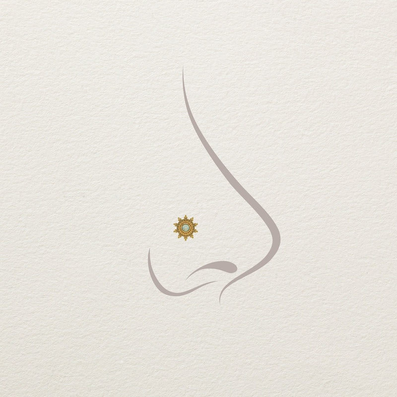 14k gold opal sunburst threadless end shown on illustrated nose piercing placement