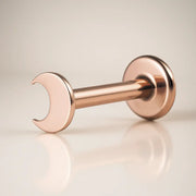 14k rose gold crescent moon flat back labret stud, angled view showing polished moon charm and post