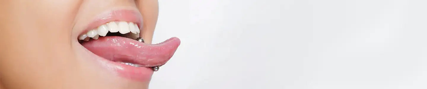 Close-up of a person's tongue with a white background