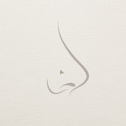 Illustrated nose profile showing the trinity diamond push pin end worn as a nose piercing stud
