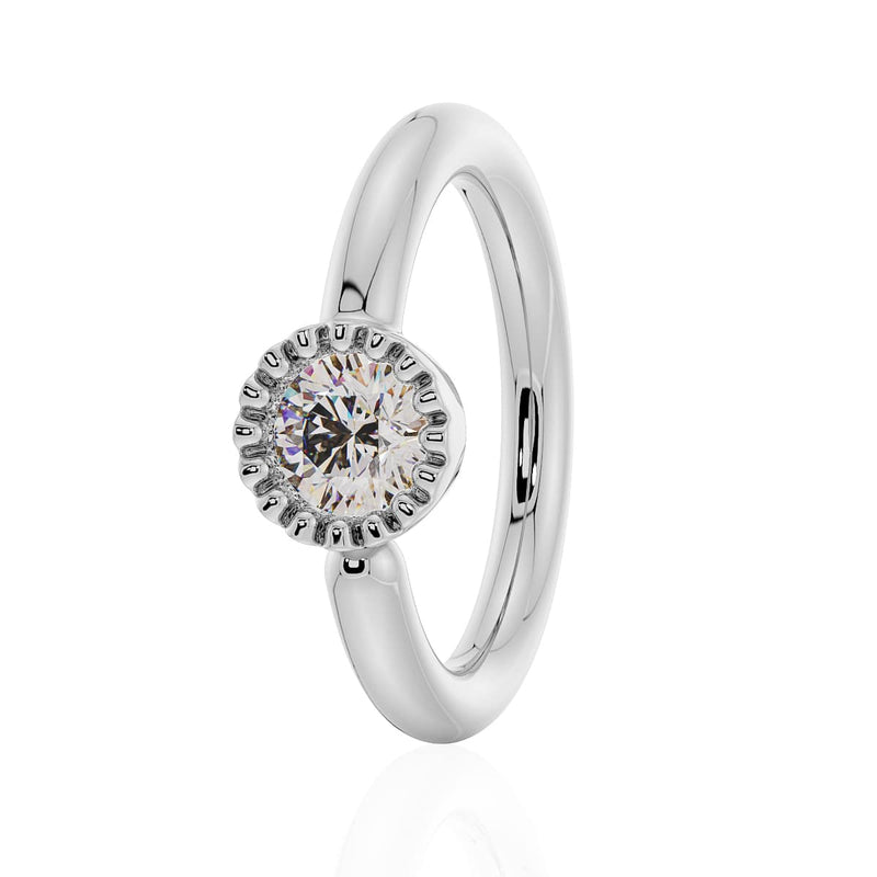 14k white gold diamond Perlage fixed bead ring with milgrain bezel setting, angled front view