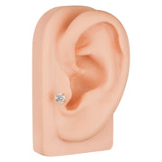 14k yellow gold diamond cartilage stud worn in lower ear lobe piercing, side profile on ear model