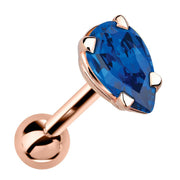 14k rose gold cartilage stud with pear-cut blue sapphire gemstone in 4-prong setting, angled view