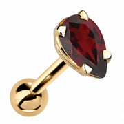 14k yellow gold cartilage stud with pear-cut deep red garnet gemstone in 4-prong basket setting, angled view
