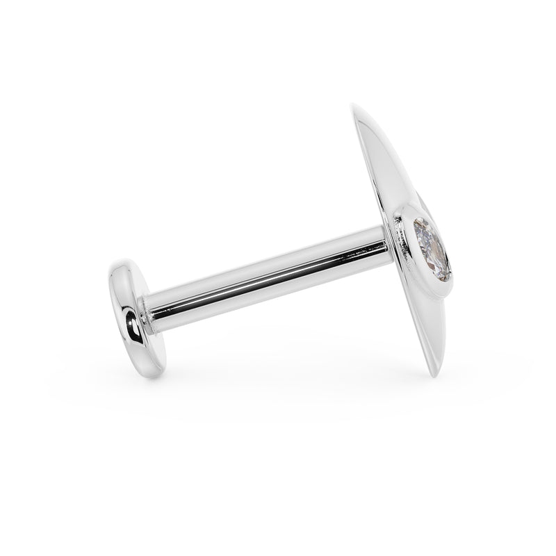 Side profile of 14K white gold alien flat back earring showing barbell length and flat disc backing