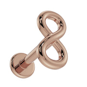 14K rose gold infinity flat back labret, overhead angled view showing curved symbol and flat backing