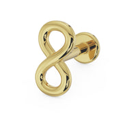 14K yellow gold infinity flat back labret stud, angled view highlighting polished finish and post depth