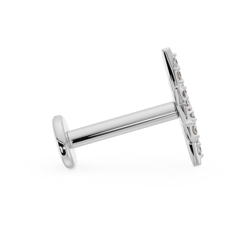 Side profile of 14K white gold north star flat back earring showing post length and flat disc back