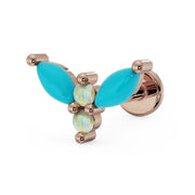 14K rose gold firefly flat back labret with turquoise marquise wings and opal gemstones, angled view