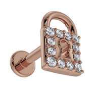 Side profile of 14k rose gold diamond lock flat back labret showing post length and flat disc backing