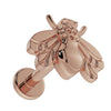 14K rose gold bee flat back labret, overhead angled view highlighting warm tone and engraved wings