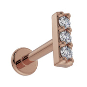 14k rose gold trinity diamond bar flat back earring, angled view showing warm tone and three-stone bar top