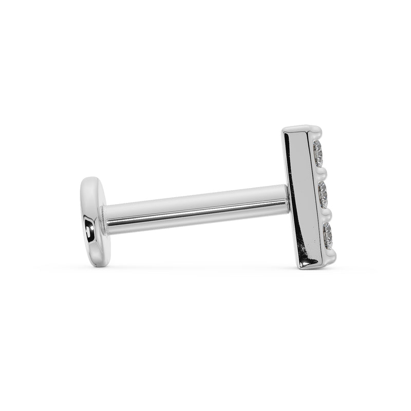 Side profile of 14k white gold diamond bar flat back earring showing post length and flat disc backing