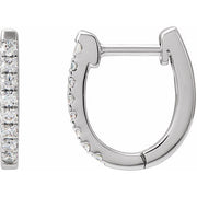 14k white gold diamond huggie hoop earrings shown from front and side profile, revealing slim 1.6mm thickness