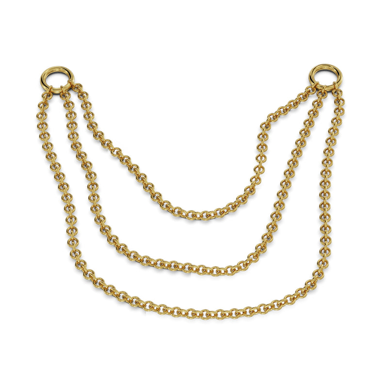 Close-up of 14k yellow gold three-link piercing connector showing larger cable chain link detail, mid-length